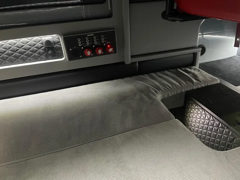 Slide: The Image of Interior of 2022 BRABUS Shadow 500 Cabin with quilted upholstery and control panel. - 49