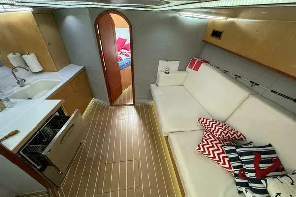 Slide: The Image of Interior of 2002 Luhrs 38 Open yacht with modern kitchen and cozy seating area. - 17
