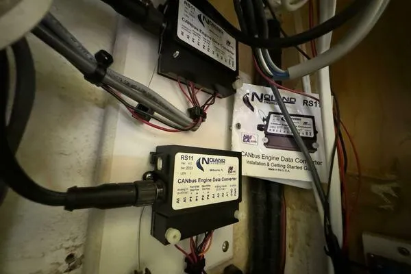 Slide: The Image of CANbus engine data converters in a 2002 Luhrs 38 Open boat. - 27