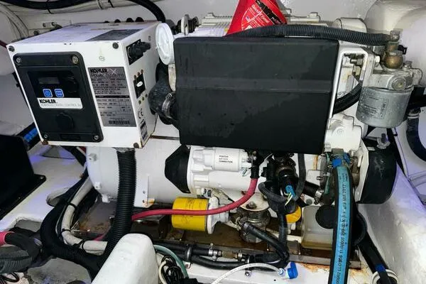 Slide: The Image of Engine room of 2002 Luhrs 38 Open boat with Kohler generator. - 28