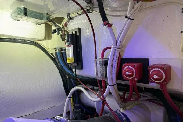 Slide: The Image of Engine room wiring and switches in a 2002 Luhrs 38 Open boat. - 29