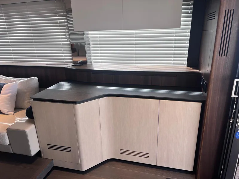 Slide: The Image of Luxurious interior of 2024 Astondoa AS5 yacht with modern cabinetry and sleek design. - 14