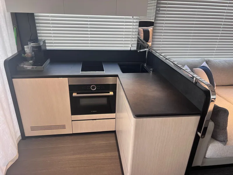 Slide: The Image of Modern kitchen in 2024 Astondoa AS5 yacht with sleek cabinetry and appliances. - 16