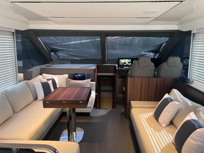 Slide: The Image of Luxurious interior of 2024 Astondoa AS5 yacht with modern seating and navigation area. - 20