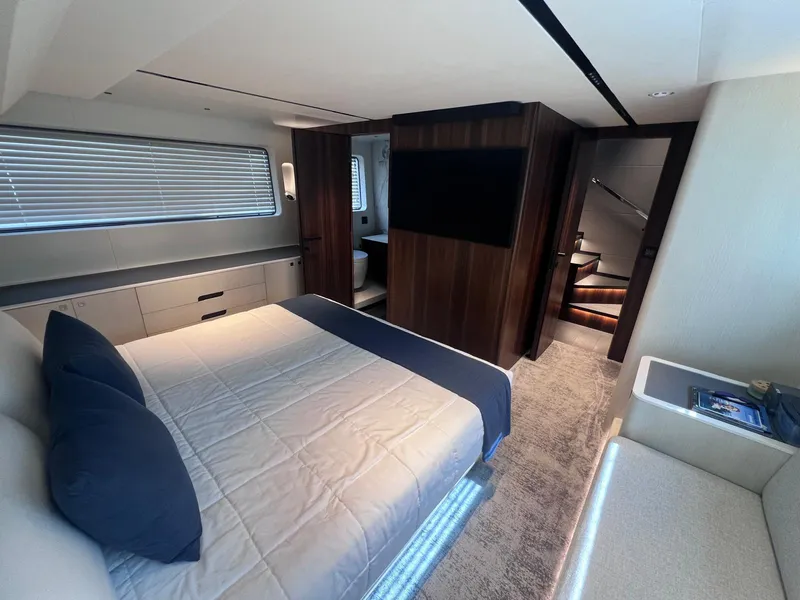 Slide: The Image of Luxurious 2024 Astondoa AS5 yacht bedroom with modern design and elegant furnishings. - 24
