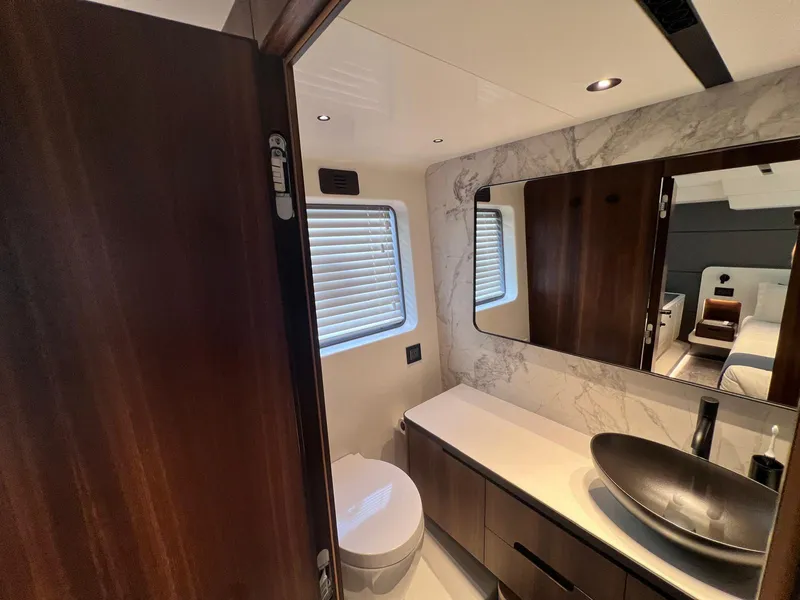 Slide: The Image of Luxurious bathroom in 2024 Astondoa AS5 yacht with modern fixtures and elegant design. - 25