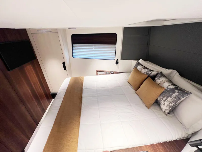 Slide: The Image of Luxurious bedroom interior of 2024 Astondoa AS5 yacht with modern design and cozy bedding. - 29