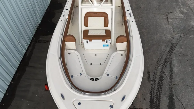 Slide: The Image of 2024 Pioneer 222 Islander boat with spacious seating and sleek design. - 8