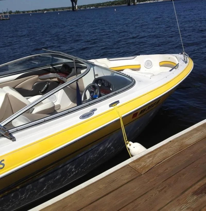 Slide: The Image of 2005 Four Winns 200 Horizon LE boat docked on a sunny day. - 3