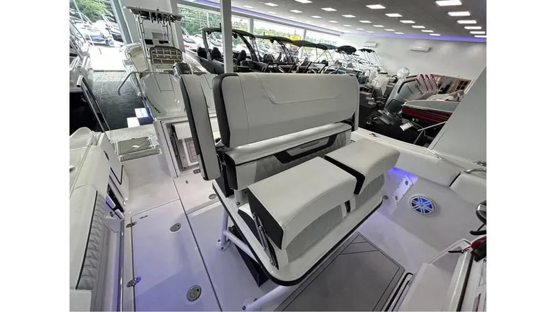 Slide: The Image of 2025 Blackfin 252 CC boat interior with modern seating and sleek design. - 12