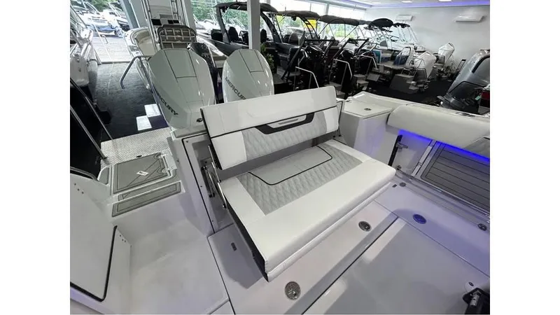 Slide: The Image of 2025 Blackfin 252 CC boat interior with seating and modern design. - 15