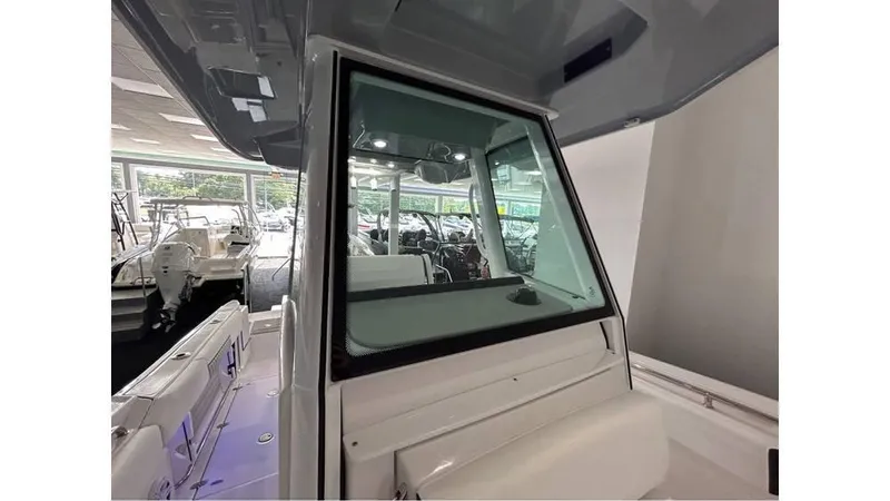 Slide: The Image of 2025 Blackfin 252 CC boat interior, showcasing sleek design and modern features. - 8