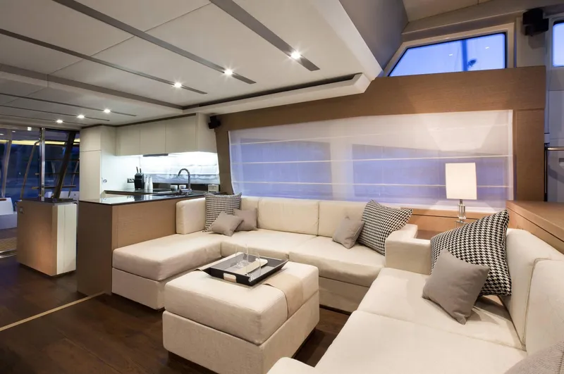 Slide: The Image of Luxurious interior of 2016 Prestige 750 yacht with modern kitchen and cozy seating area. - 15