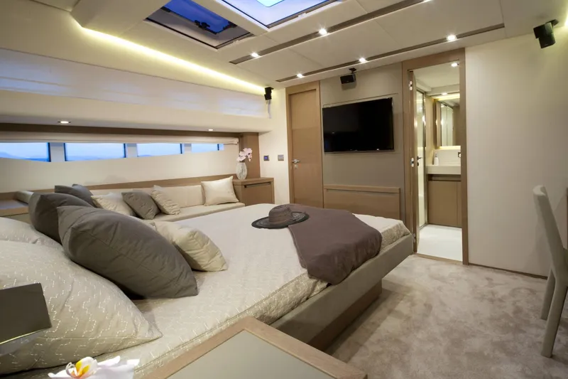Slide: The Image of Luxurious interior of 2016 Prestige 750 yacht with elegant bedroom and modern amenities. - 24