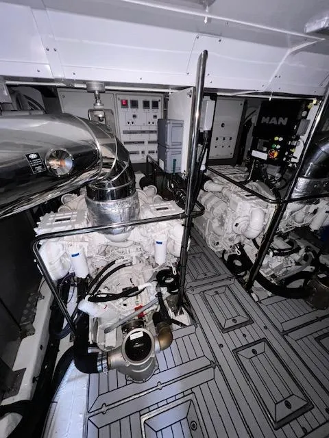 Slide: The Image of Engine room of 2016 Prestige 750 yacht with MAN engines and control panels. - 37
