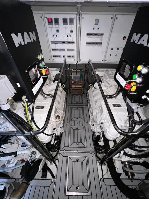 Slide: The Image of Engine room of 2016 Prestige 750 yacht with MAN engines and control panels. - 41