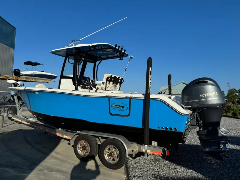 Slide: The Image of 2020 Sea Hunt Gamefish 25 boat on trailer with Yamaha outboard motor. - 3