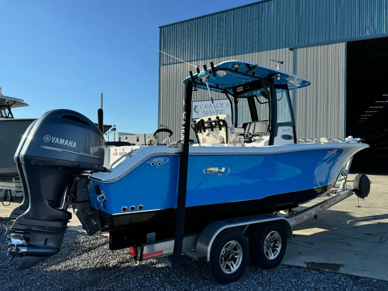 Slide: The Image of 2020 Sea Hunt Gamefish 25 boat with Yamaha engine on trailer. - 6