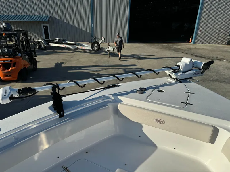 Slide: The Image of 2020 Sea Hunt Gamefish 25 boat with trolling motor at marina. - 9