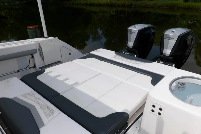 Slide: The Image of 2020 Robalo R317 Dual Console boat with spacious seating and twin engines. - 13
