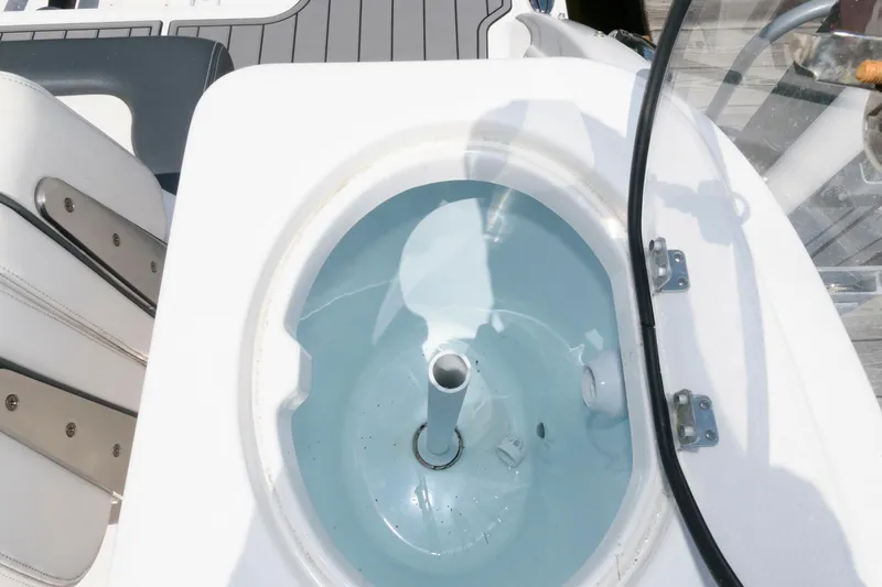 Slide: The Image of Livewell on 2020 Robalo R317 Dual Console boat, featuring sleek design and functionality. - 17