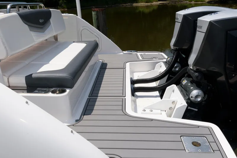 Slide: The Image of 2020 Robalo R317 Dual Console boat with seating and twin engines. - 3