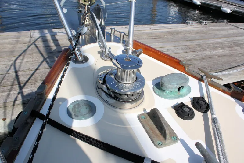Slide: The Image of Deck of 1987 Morris Linda sailboat with winch and cleats, docked at marina. - 17