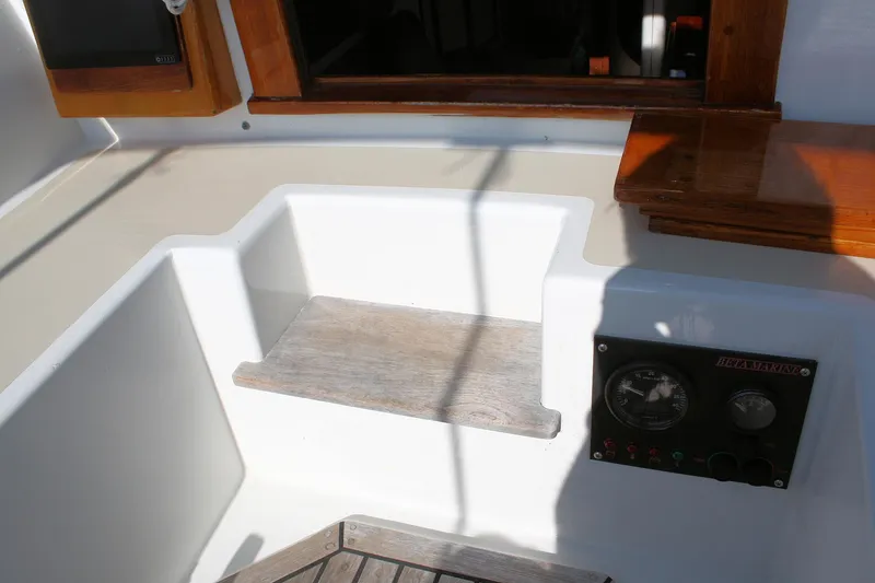 Slide: The Image of Cockpit of 1987 Morris Linda sailboat with wooden accents and control panel. - 20