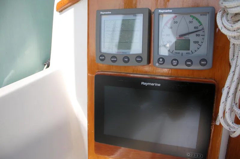 Slide: The Image of Boat navigation instruments on a 1987 Morris Linda yacht dashboard. - 23
