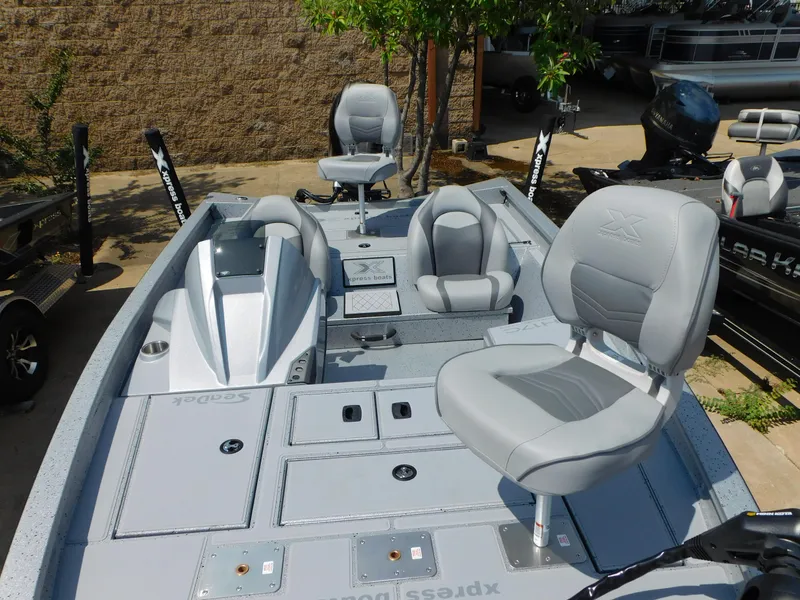 Slide: The Image of 2025 Express h17C boat with gray seating and storage compartments. - 5