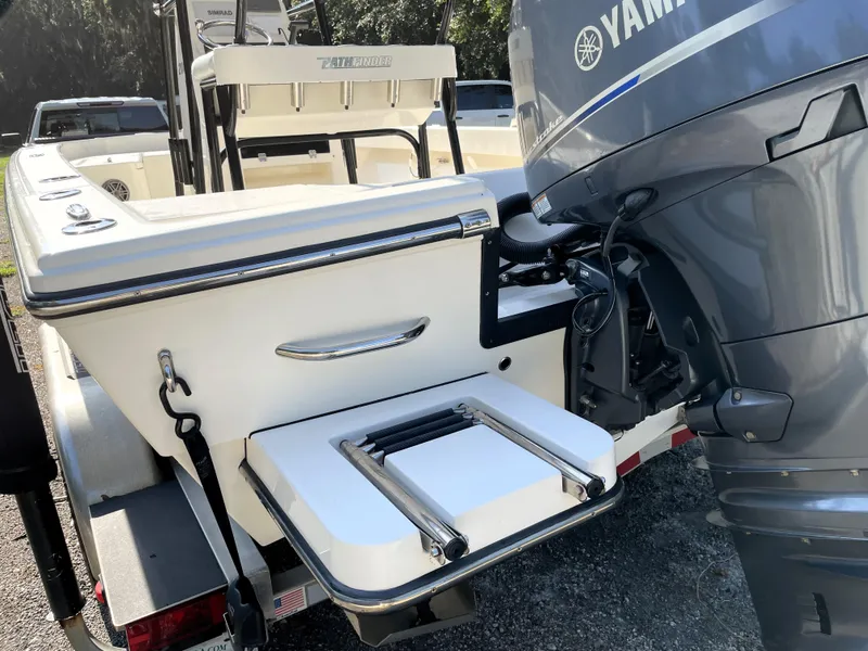 Slide: The Image of Pathfinder 2005 TRS boat with Yamaha motor, featuring a swim platform and ladder. - 13