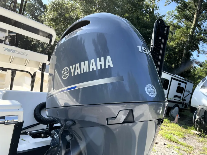 Slide: The Image of Yamaha outboard motor on 2021 Pathfinder 2005 TRS boat, parked outdoors. - 15