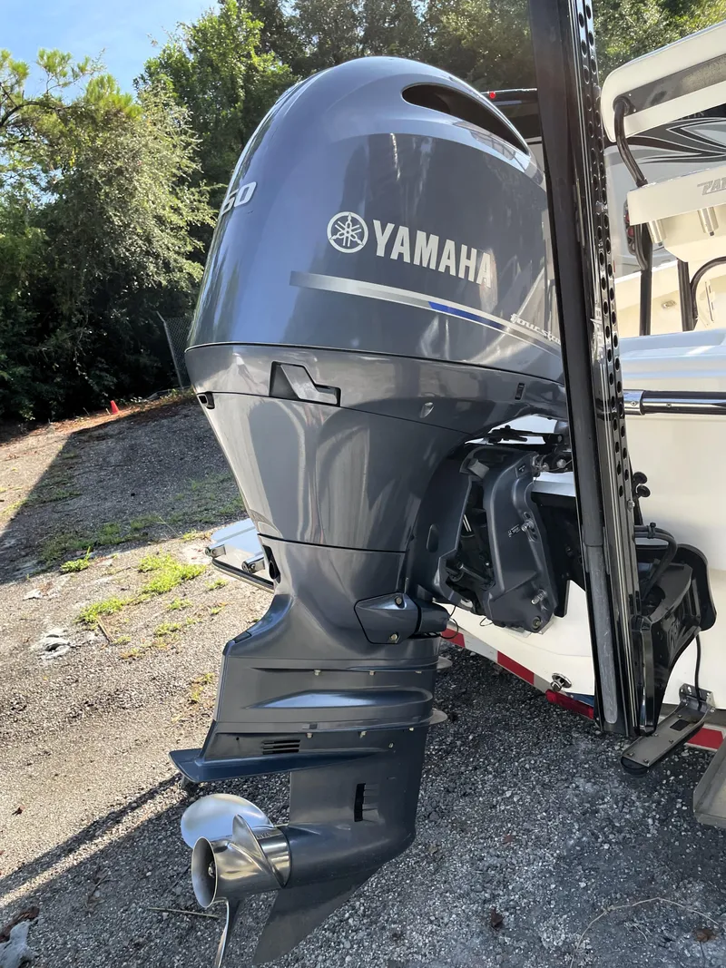 Slide: The Image of Yamaha outboard motor on 2021 Pathfinder 2005 TRS boat, parked outdoors. - 17