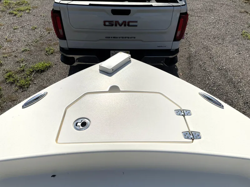 Slide: The Image of Bow of 2021 Pathfinder 2005 TRS boat near GMC Sierra truck. - 27