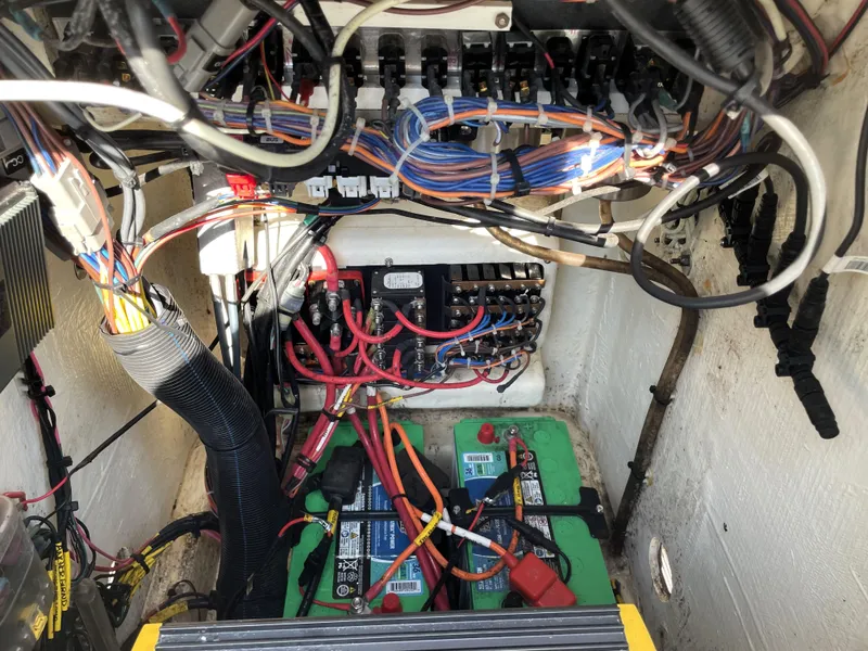 Slide: The Image of Electrical wiring and battery setup in a 2021 Pathfinder 2005 TRS boat. - 33