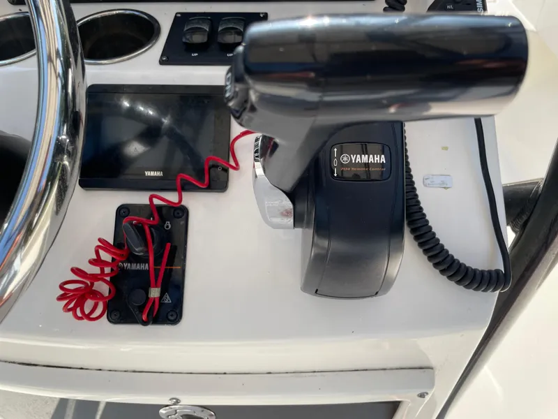 Slide: The Image of Control panel of a 2021 Pathfinder 2005 TRS boat with Yamaha throttle. - 39