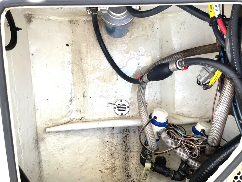 Slide: The Image of Boat bilge area with hoses and wiring, Pathfinder 2005 TRS, 2021 model. - 43