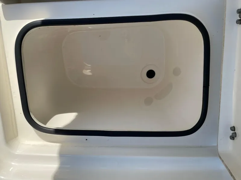 Slide: The Image of Pathfinder 2005 TRS 2021 model boat storage compartment, open and empty. - 46