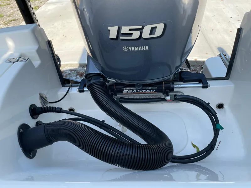 Slide: The Image of Yamaha 150 outboard motor on 2021 Pathfinder 2005 TRS boat, featuring SeaStar hydraulic steering. - 47