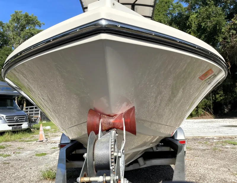 Slide: The Image of Front view of a 2021 Pathfinder 2005 TRS boat on a trailer. - 9