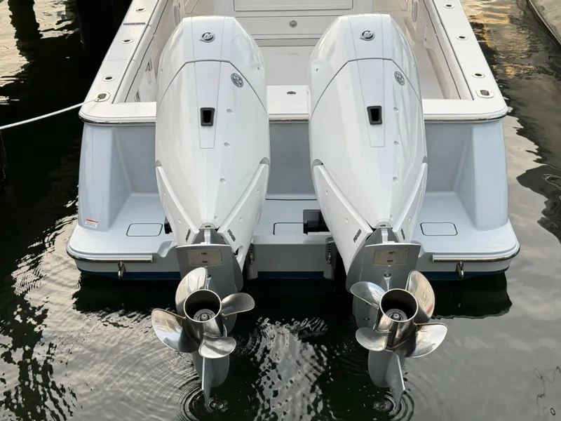 Slide: The Image of 2025 Valhalla Boatworks V-33 with dual outboard engines in water. - 15