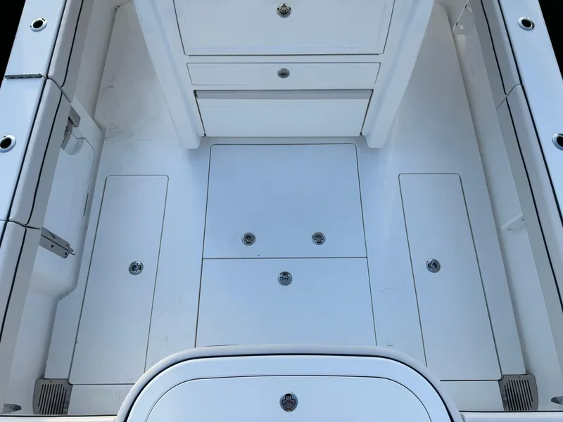 Slide: The Image of Valhalla Boatworks V-33 2025 model, featuring a sleek, white deck design. - 18