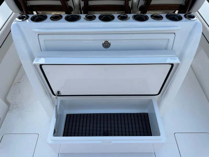 Slide: The Image of Valhalla Boatworks V-33 2025 fishing rod holders and storage compartment. - 23