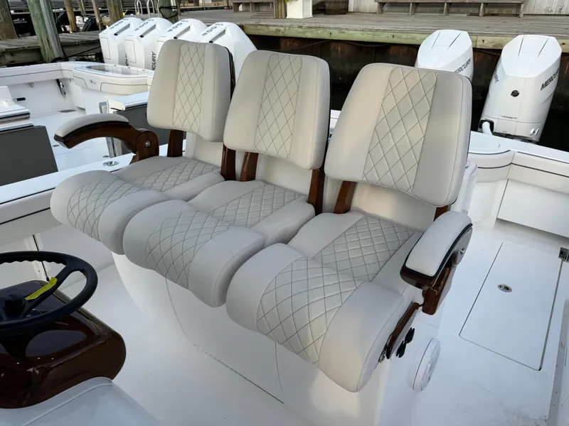 Slide: The Image of Luxurious seating on 2025 Valhalla Boatworks V-33 with diamond-stitched upholstery. - 32
