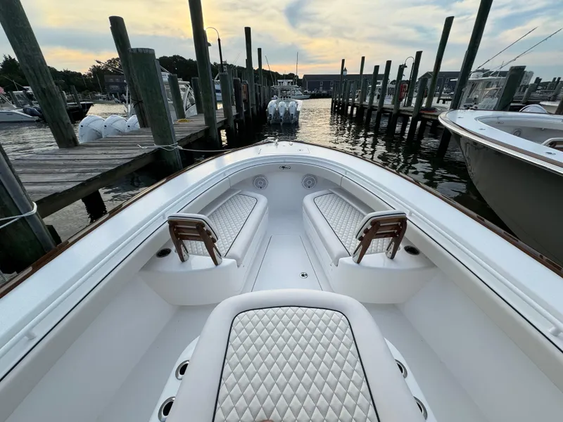 Slide: The Image of 2025 Valhalla Boatworks V-33 at marina, featuring luxurious seating and elegant design. - 43