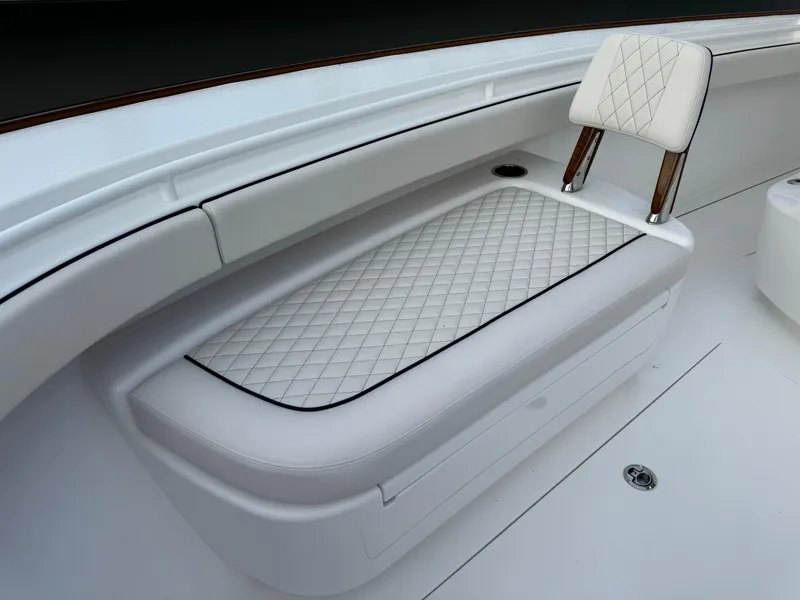 Slide: The Image of 2025 Valhalla Boatworks V-33 interior with quilted seating and sleek design. - 47