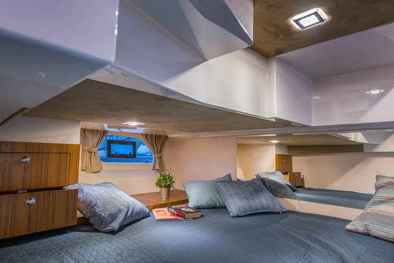 Slide: The Image of Luxurious cabin interior of 2025 Marex 360 Cabriolet Cruiser with cozy bedding and modern design. - 21