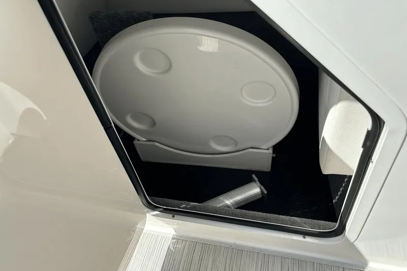 Slide: The Image of Storage compartment in a 2022 Sea Ray 270 Sundeck Outboard boat. - 17