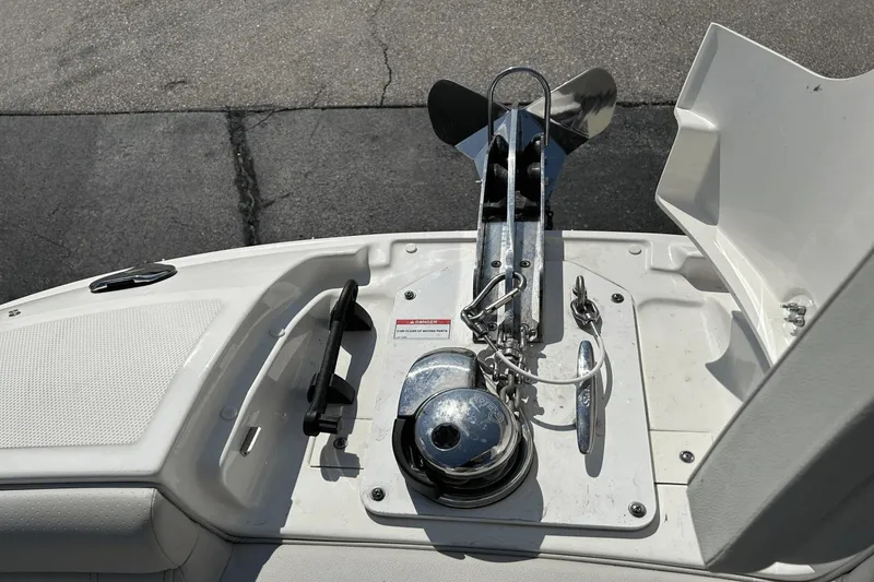Slide: The Image of Anchor system on 2022 Sea Ray 270 Sundeck Outboard boat, featuring stainless steel components. - 18