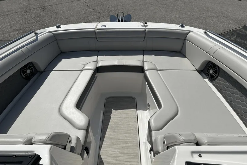 Slide: The Image of 2022 Sea Ray 270 Sundeck Outboard boat interior with spacious seating and modern design. - 8